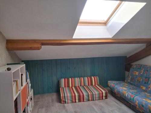 Χώρος καθιστικού στο Hebergement calme et verdoyant