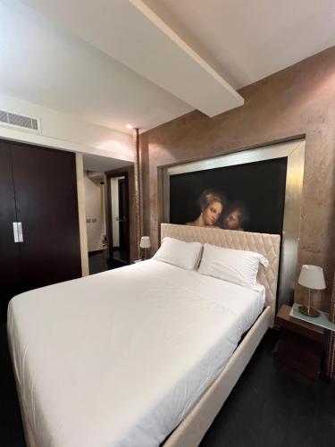 Ένα ή περισσότερα κρεβάτια σε δωμάτιο στο Le stanze di caterina