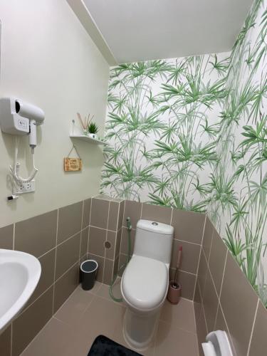 Et badeværelse på Satori Residences