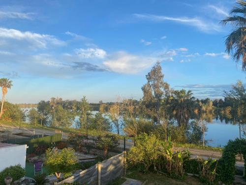a view of a lake from a house at Casa Joan de l'Illa in Deltebre