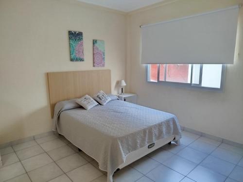 Postel nebo postele na pokoji v ubytování Amanecer Correntino