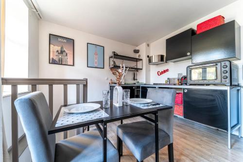 Kuchyň nebo kuchyňský kout v ubytování Le Refuge - Parking privée - Wifi - Netflix