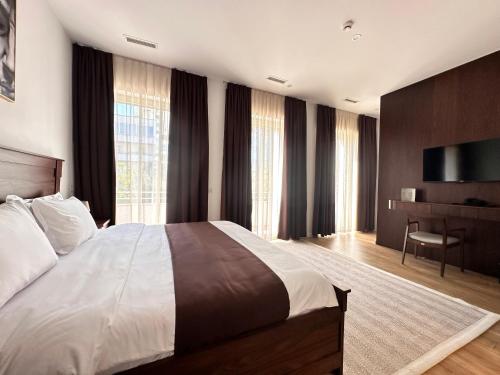 Ένα ή περισσότερα κρεβάτια σε δωμάτιο στο Palazzo Roma- Luxury Leading Hotels