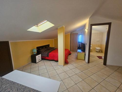 Ένα ή περισσότερα κρεβάτια σε δωμάτιο στο La Villetta Gialla