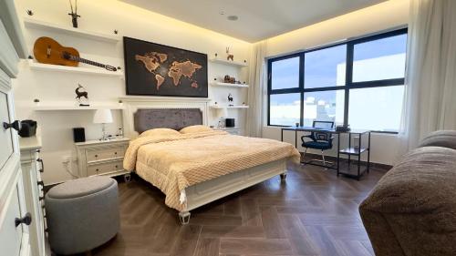 Postel nebo postele na pokoji v ubytování Zeo home suite