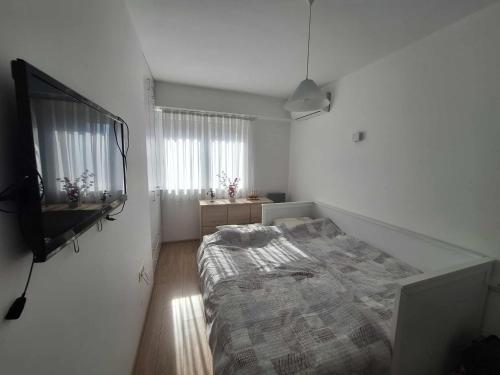 Ένα ή περισσότερα κρεβάτια σε δωμάτιο στο S&SApartment