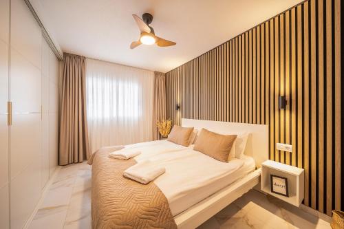 a bedroom with a large bed in a room at Skyview Apartment in Adeje