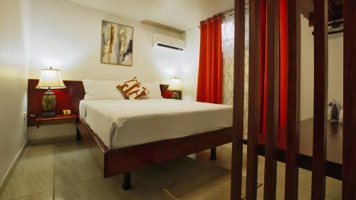 Ένα ή περισσότερα κρεβάτια σε δωμάτιο στο Casa Sambola