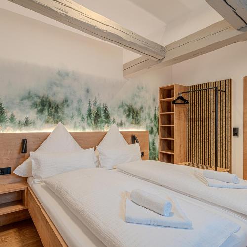 Ένα ή περισσότερα κρεβάτια σε δωμάτιο στο Schwarzwaldmarie Bernau