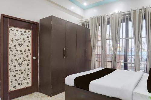 Ένα ή περισσότερα κρεβάτια σε δωμάτιο στο Hotel O Keptown