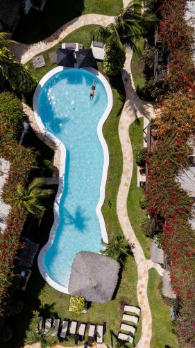 an overhead view of a swimming pool in a resort at Enjoy Jeri Praia in Jericoacoara