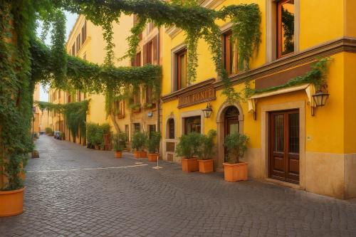 an empty street with potted plants on the side of a yellow building at REALE COLOSSEO TREVI HOME - private garden in Rome