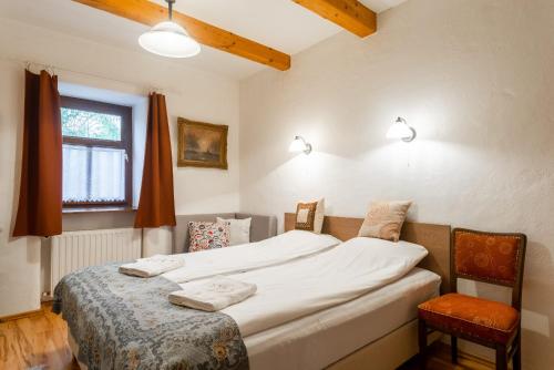 Ένα ή περισσότερα κρεβάτια σε δωμάτιο στο Kicsi Gólya 2