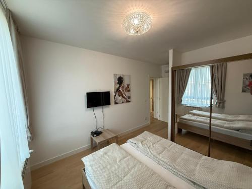 Postel nebo postele na pokoji v ubytování BelgradeWATERFRONT - Apartments