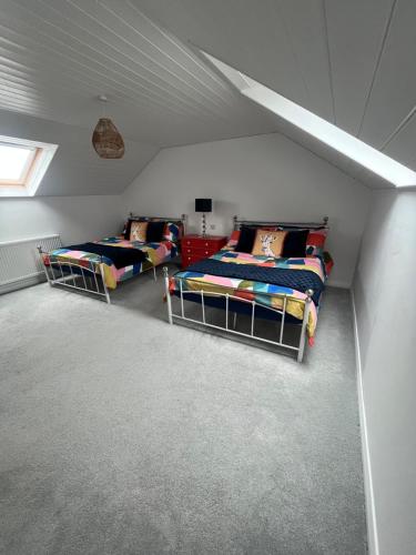 Postel nebo postele na pokoji v ubytování The Stable Springmount Accommodation