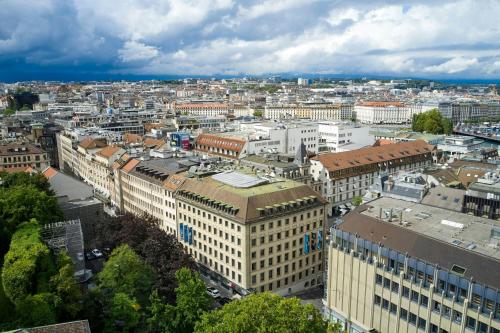 an aerial view of a city with buildings at citizenM Geneva in Geneva