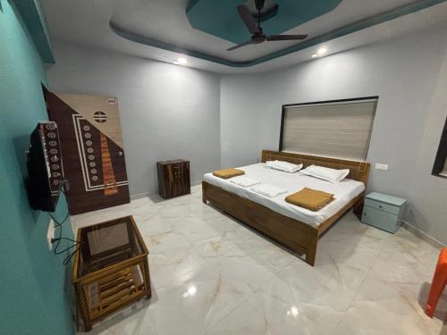 Postel nebo postele na pokoji v ubytování Lake Breeze Resort