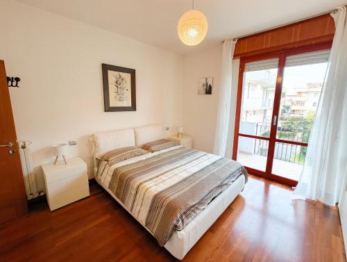 Ένα ή περισσότερα κρεβάτια σε δωμάτιο στο Casa Felice 28