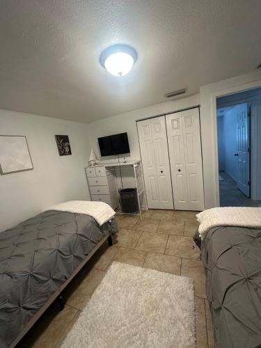 Ένα ή περισσότερα κρεβάτια σε δωμάτιο στο CasaStay