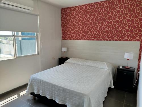 Giường trong phòng chung tại EDIFICIO REY NIÑO