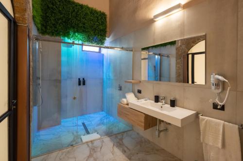 Et badeværelse på VICO 58 Rooms