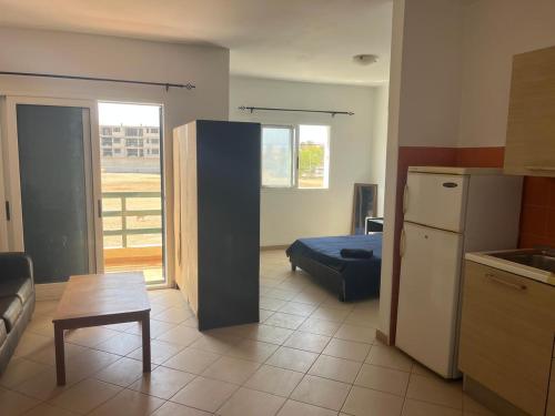 Η κουζίνα ή μικρή κουζίνα στο Central Studio Apartment near beach