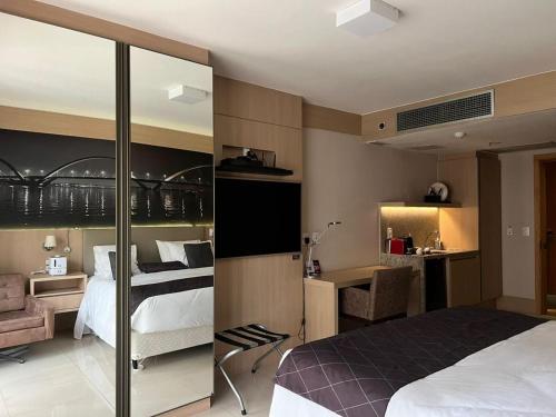 Ένα ή περισσότερα κρεβάτια σε δωμάτιο στο Cullinan Brasilia - Fabuloso apartamento da REDE PREMIUM 05