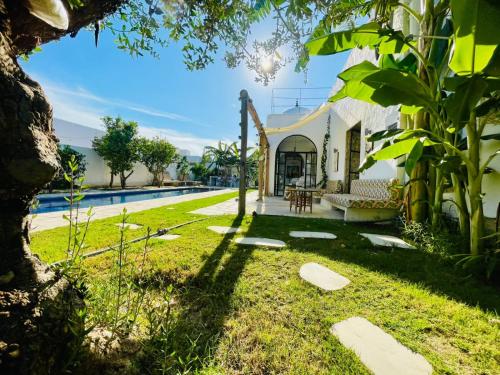 Κήπος έξω από το Casa Dea - Bungalow DS