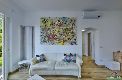 Ένα ή περισσότερα κρεβάτια σε δωμάτιο στο Casa Giuditta with Air Conditioning and Pool