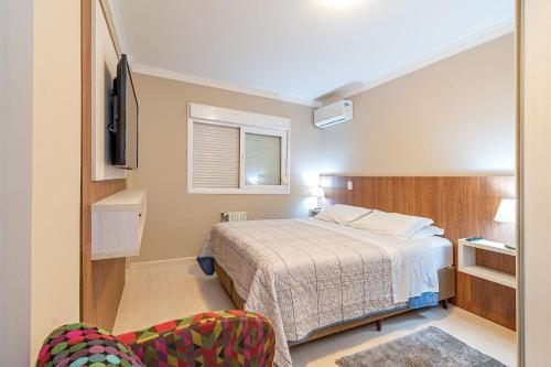 Postel nebo postele na pokoji v ubytování 1 quadra da Catedral em Canela