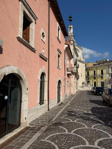 an empty cobblestone street in an old town at B&B Popoli Terme in Popoli