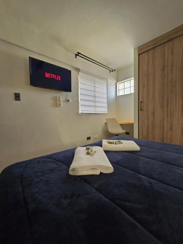 Postel nebo postele na pokoji v ubytování AH Residencial