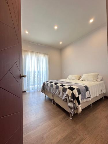 Postel nebo postele na pokoji v ubytování Acogedor departamento de 2 dormitorios