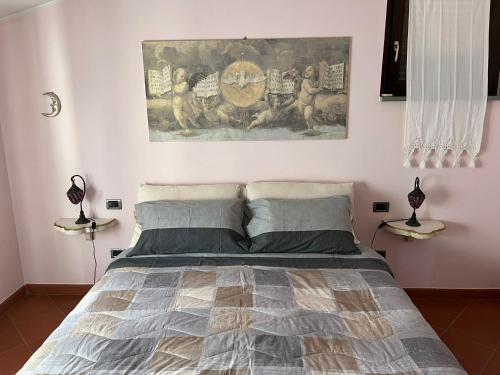 Una cama o camas en una habitación de Le Valli di Piero