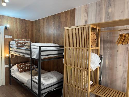 Ένα ή περισσότερα κρεβάτια σε δωμάτιο στο Acogedor Estudio en Pas de la Casa a pie de pistas