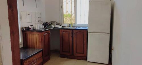 Kuchyň nebo kuchyňský kout v ubytování Elite Bookings Happy Homes And NJUFFA Enterprise