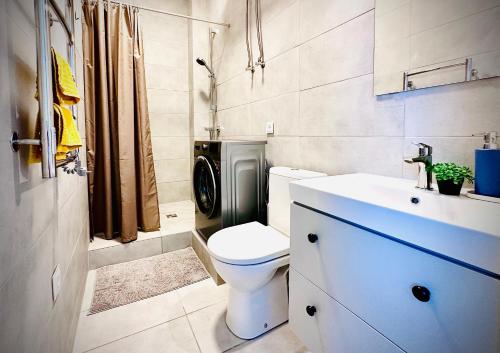 Koupelna v ubytování M&M Apartment III SELF CHECK-IN