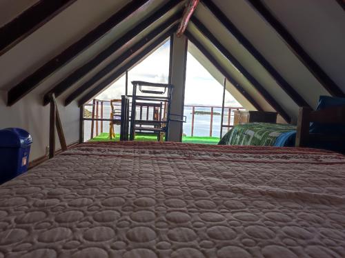 Postel nebo postele na pokoji v ubytování Ecolodge Aymara