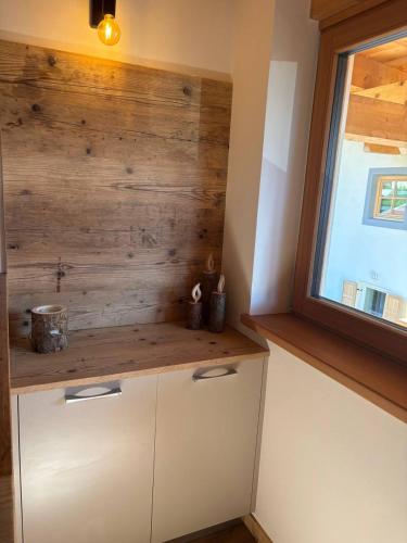 Η κουζίνα ή μικρή κουζίνα στο Pragma Apartments - Wood Lodge Predazzo