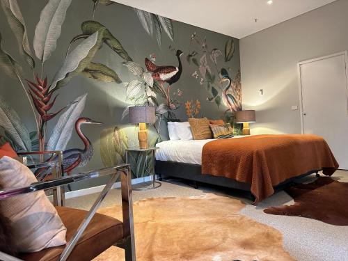 Postel nebo postele na pokoji v ubytování The Grand Oaks