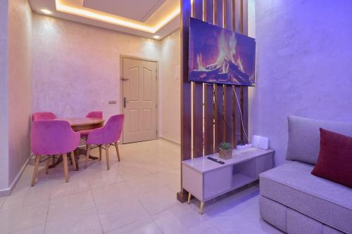 Χώρος καθιστικού στο Appartement l'aéroport