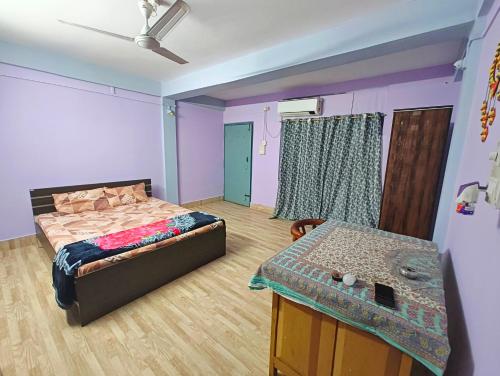 Postel nebo postele na pokoji v ubytování Taj Residency Holiday Homestay 767ooo54oo - Entire 1BHK-2BHK starting 1500