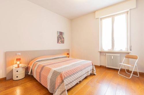 Ένα ή περισσότερα κρεβάτια σε δωμάτιο στο Verona Lodge