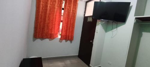 Μια τηλεόραση ή/και κέντρο ψυχαγωγίας στο Hospedaje Paraíso