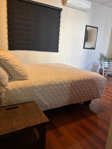 Postel nebo postele na pokoji v ubytování habitacion Cerezo