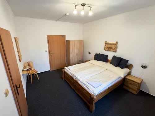 Ένα ή περισσότερα κρεβάτια σε δωμάτιο στο Hotel Gader a reštaurácia RaMarti