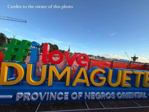 a sign that says i love dump marmite at Norman Condominium Unit Rental Sea View in Dumaguete