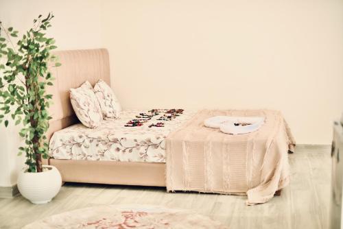 Ένα ή περισσότερα κρεβάτια σε δωμάτιο στο Legend Pyramids Inn