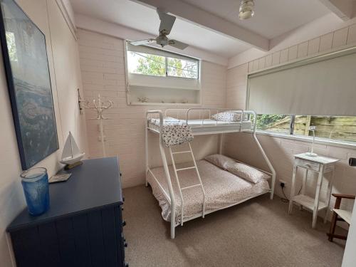 Postel nebo postele na pokoji v ubytování Australian Beach and Sea Haven managed by Batemans Bay Accom