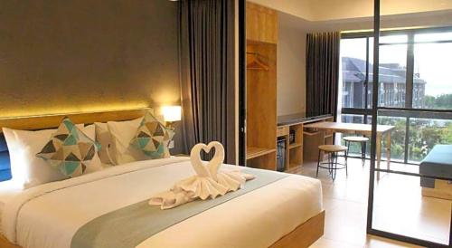 En eller flere senge i et værelse på Anagata Tanjung Benoa 4